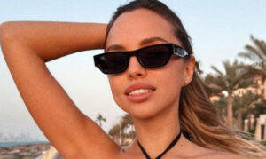 Veronica Bielik Flaunts Massive Cleavage In A Black Bikini Top While