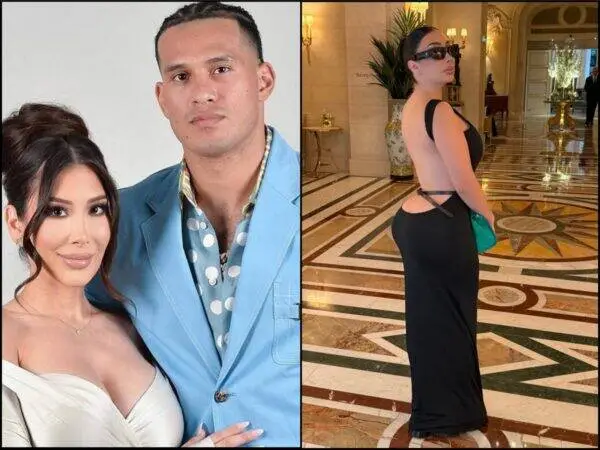 Couple photo: woman in white off‑the‑shoulder dress and man in a light blue suit posing together.