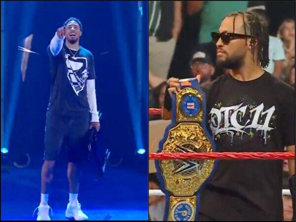 Two men at a wrestling show: left man on stage pointing to the audience, wearing a black tee, white sleeves, shorts and white sneakers; right man in sunglasses with a large championship belt.