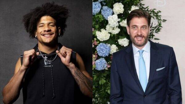 Side-by-side: left, a smiling man with curly hair wearing a black sleeveless hoodie and chains; right, a man in a navy suit with a light blue tie at a floral backdrop.