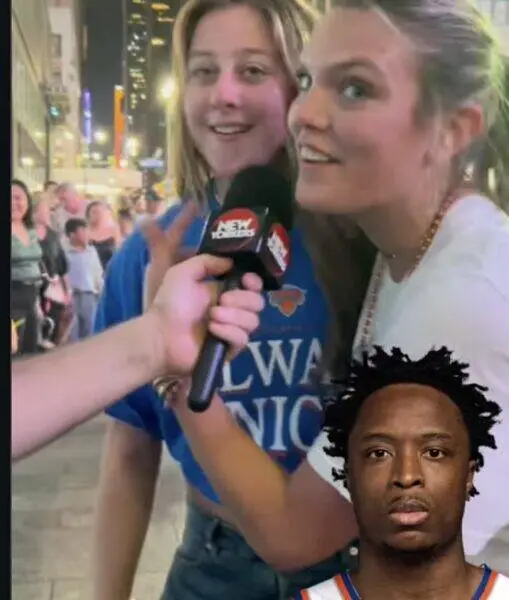 Two young women are interviewed on a busy city sidewalk at night, one holding a microphone with a news logo as a crowd watches in the background.