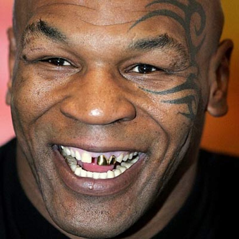 Mike Tyson Says Pet Tiger Knocked His Teeth Out When He Tried To Kiss ...