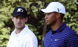 Tiger Woods of the US walks with Dallas