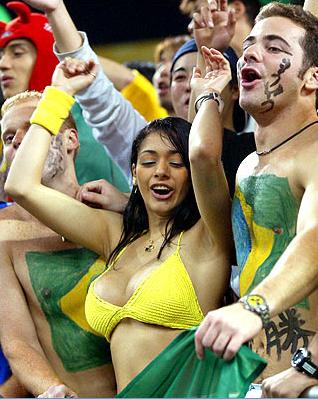 Brazilian Fan Boobs Falls Out of Her Top at World Cup (Photos