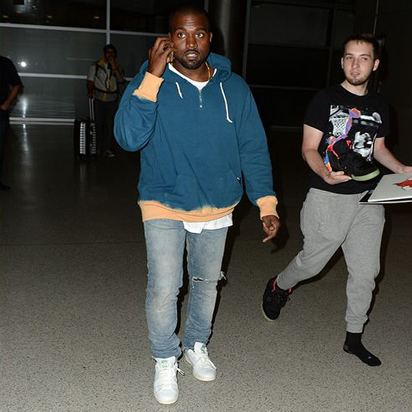 Kanye-west-ignoring-kid-wanting-him-to-sign-yeezy