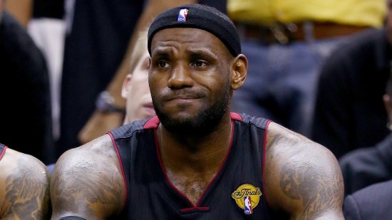 lebron-james-sad-face-game-5-loss-spurs-2014-nba-finals-e1407973879785.jpg