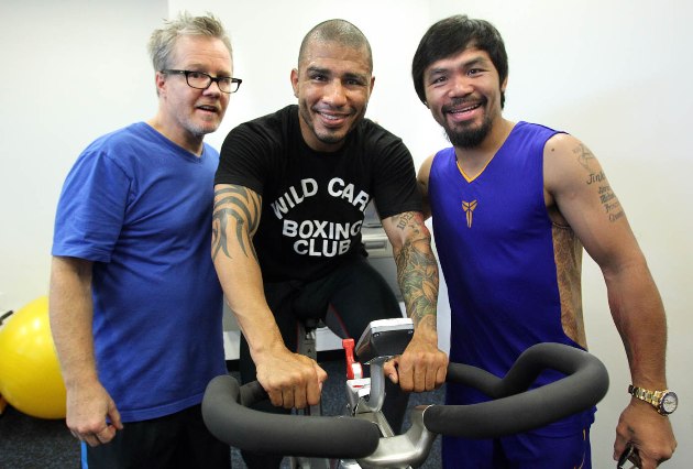 August 9, 2013, Hollywood,Ca.  ---  "SURPRISE VISIT" ---  Superstar Manny Pacquiao (R) makes a surprise visit to the Wildcard Boxing Club in Hollywood,Ca. to wish good luck to three-time world champion Miguel Cotto(ctr). Cotto is finishing up the first week of training with his new trainer Freddie Roach (L) ,who is also Pacquiao's trainer. Cotto prepares for his upcoming 12-round super welterweight battle against current top-five contender Delvin Rodriguez.      Promoted by Miguel Cotto Promotions and Top Rank, in association with Joe DeGuardia's Star Boxing and Tecate,   Cotto vs. Rodriguez will take place Saturday, October 5 at the Amway Center in Orlando, Florida.        Pacquiao will take on former world champion Brandon "Bam Bam" Rios at The Venetian Macao Resort in Macau,China. Pacquiao vs Rios will be televised live in the US, Saturday, Nov. 23, 9pm ET/6pm PT on HBO Pay-Per-View.  --- Photo Credit : Chris Farina - Top Rank (no other credit allowed) copyright 2013