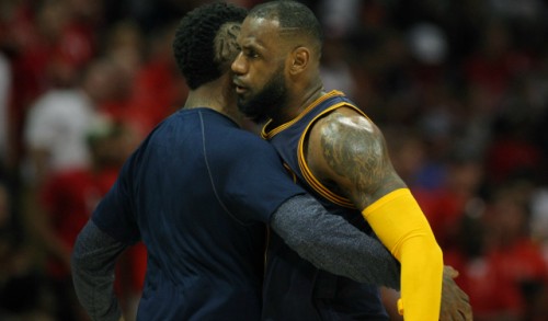 May 22, 2015; Atlanta, GA, USA; Cleveland Cavaliers forward LeBron James (23) hugs guard J.R. Smith (left) during the third quarter in game two of the Eastern Conference Finals of the NBA Playoffs against the Atlanta Hawks at Philips Arena. Mandatory Credit: Brett Davis-USA TODAY Sports