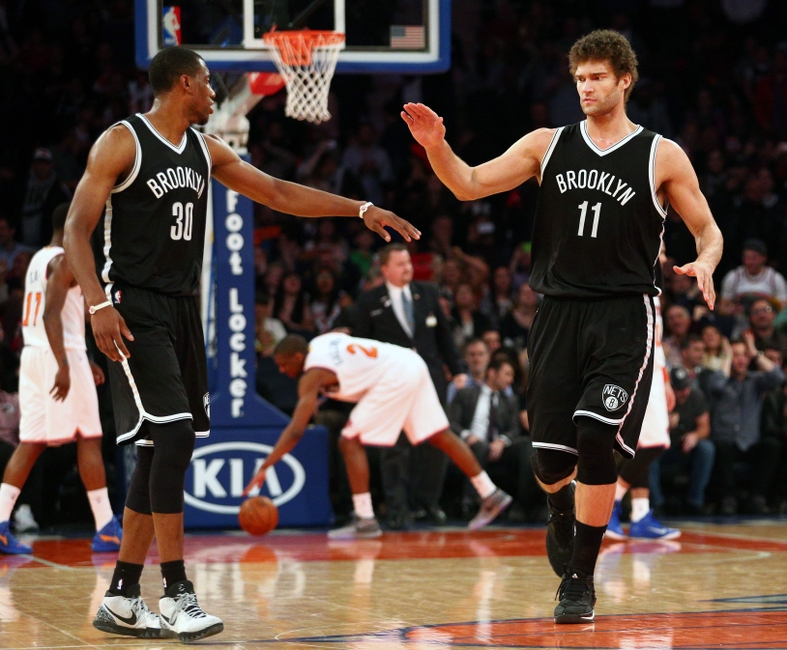 Apr 1, 2015; New York, NY, USA; Brooklyn Nets center Brook Lopez (11) high fives small forward Thaddeus Young (30) after hitting the go-ahead shot against the New York Knicks with two second left during the fourth quarter at Madison Square Garden. The Nets defeated the Knicks 100-98. Mandatory Credit: Brad Penner-USA TODAY Sports