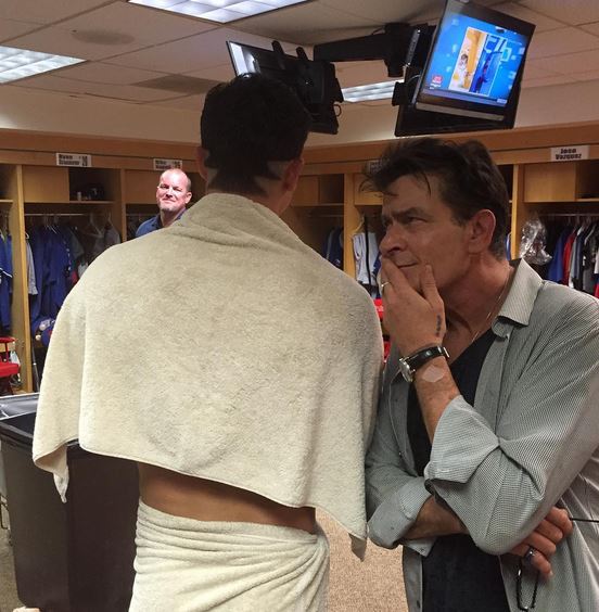 Photo: Derek Holland, who has been rocking a 'Wild Thing' haircut recently,  meets Charlie Sheen