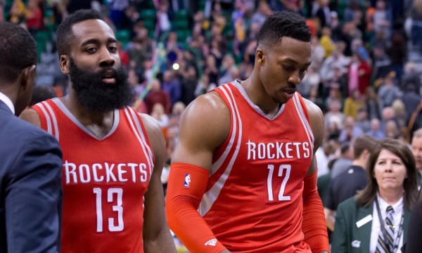 Feb 23, 2016; Salt Lake City, UT, USA; Houston Rockets guard James Harden (13) and center Dwight Howard (12) leave the court after the game against the Utah Jazz at Vivint Smart Home Arena. Utah won in overtime 117-114. Mandatory Credit: Russ Isabella-USA TODAY Sports ORG XMIT: USATSI-232980 ORIG FILE ID:  20160223_jla_ai4_419.jpg