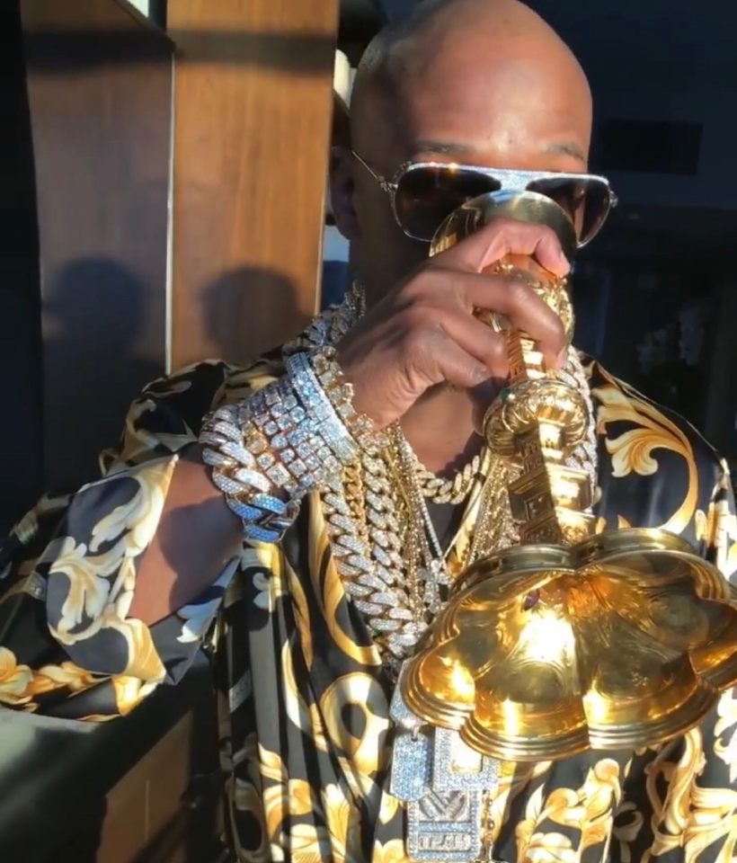 Video: Floyd Mayweather Drinks Out Of Gold Cup In Versace Robe While