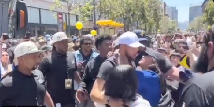 Random Woman Tried To Kiss Steph Curry During Warriors' Parade