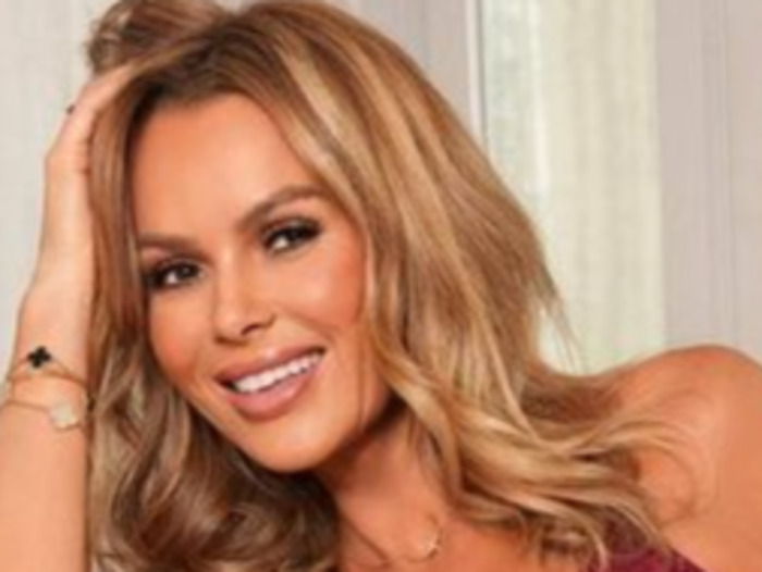 Oops! Amanda Holden flashes her breast by accident during BGT