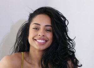 Fitness Trainer Qimmah Russo Goes Viral For Lips Tattooed Booty, Pretty