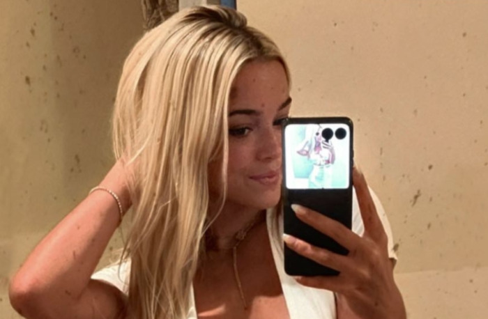 LSU Gymnast Olivia Dunne Poses Sexy White Dress in Italy