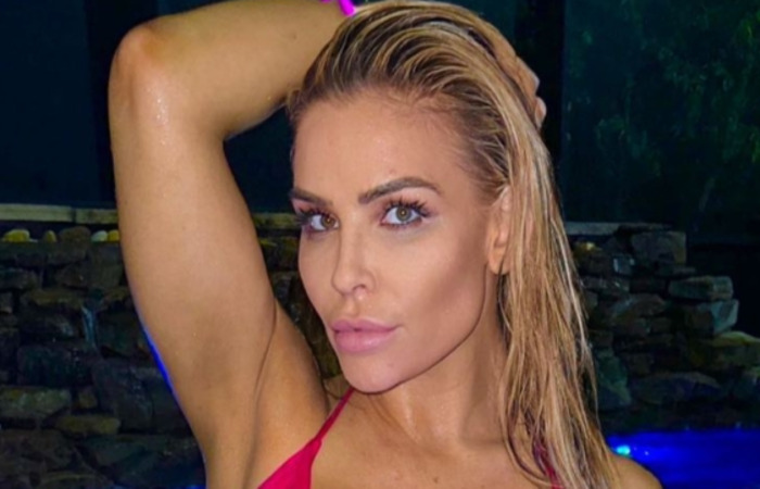 WWE Natalya Neidhart Squats In A Pool Showing Off Her Curves In A Red Bikini