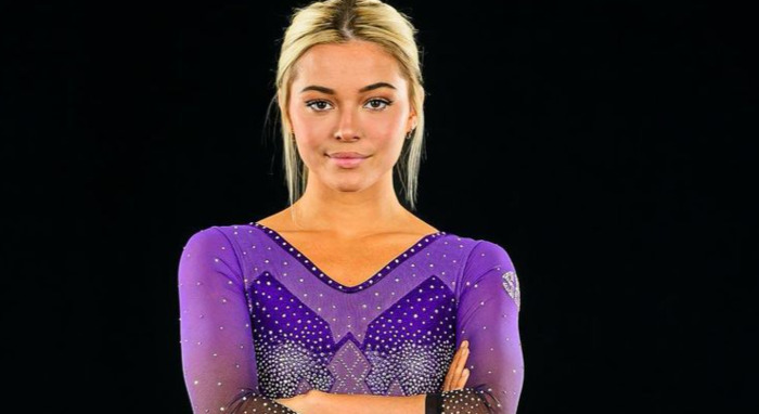 Olivia Dunne Shows Off Long Legs And Curves In Signature Purple Lsu Leotard During Picture Day