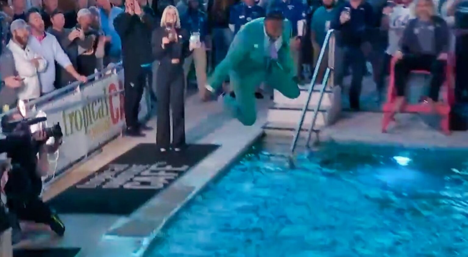 Before Monday Night Football, Robert Griffin III Stunned Everyone by Belly-Flopping Into the Jacksonville Jaguars Pool While Wearing His Suit (VIDEO)