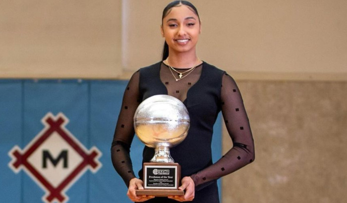 Juju Watkins Shows Off Her Long Legs In Black Lace Dress While Posing With Her USBWA Freshman Of The Year Trophy