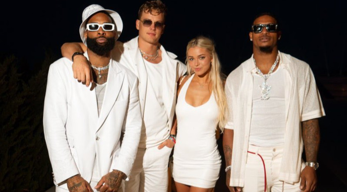 Fans Mock Paul Skenes Over His Girlfriend Olivia Dunne Getting Sandwiched Between Joe Burrow, Odell Beckham Jr., And Ja’Marr Chase At Michael Rubin’s Exclusive “All white” Party