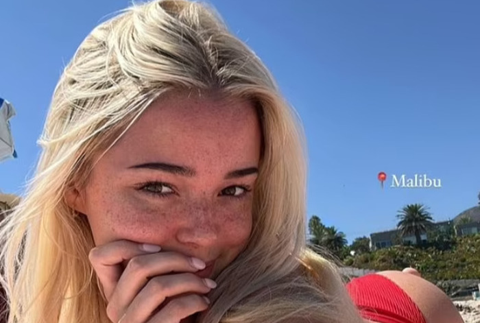 Olivia Dunne Flaunts Her Bum In A Tiny Red Bikini While Lying On A Beach In Malibu