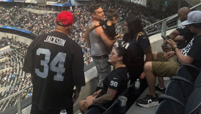 Fans Call For The Arrest Of Drunk Raiders Fan Dangling His Little Daughter Over Railing During Chargers-Raiders Game At SoFi Stadium