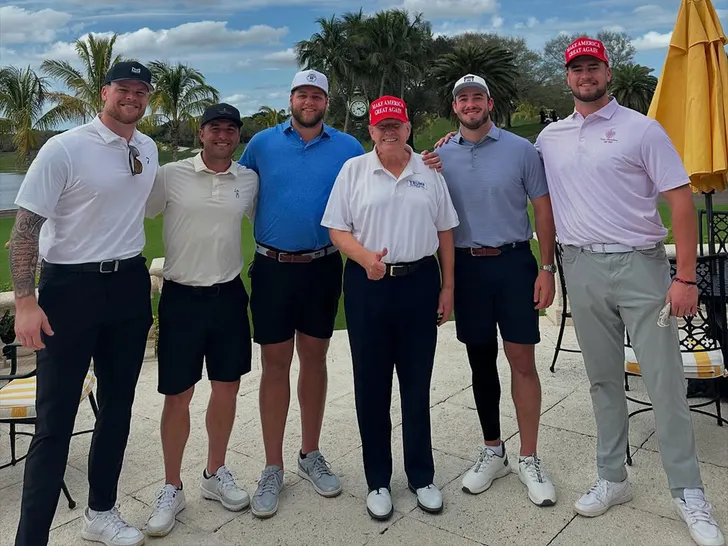 Players From the Buffalo Bills Take a Picture With President Donald Trump at His Golf Course