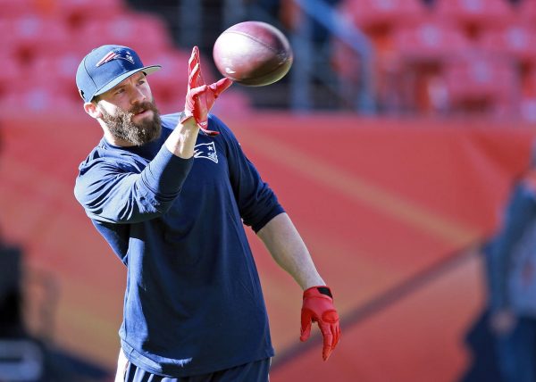 (Denver, MA, 01/24/16) New England Patriots wide receiver Julian Edelman warms up before the AFC Championship game against the Denver Broncos at Sports Authority Field at Mile High on January 24, 2016. Staff photo by Matt Stone