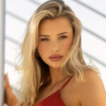 Hockey Goalie Mikayla Demaiter Goes Viral in Red Baywatch Bikini