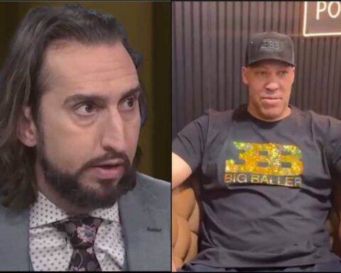Split-screen podcast interview with two men: left is a bearded man in a suit speaking, right is a man in a cap and dark T-shirt seated in a studio.