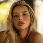 Mikayla Demaiter Plays Pool in Orange Bikini