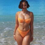 Watch Chloe Bailey Show Off Oiled Bum Before Diving Into The Sea