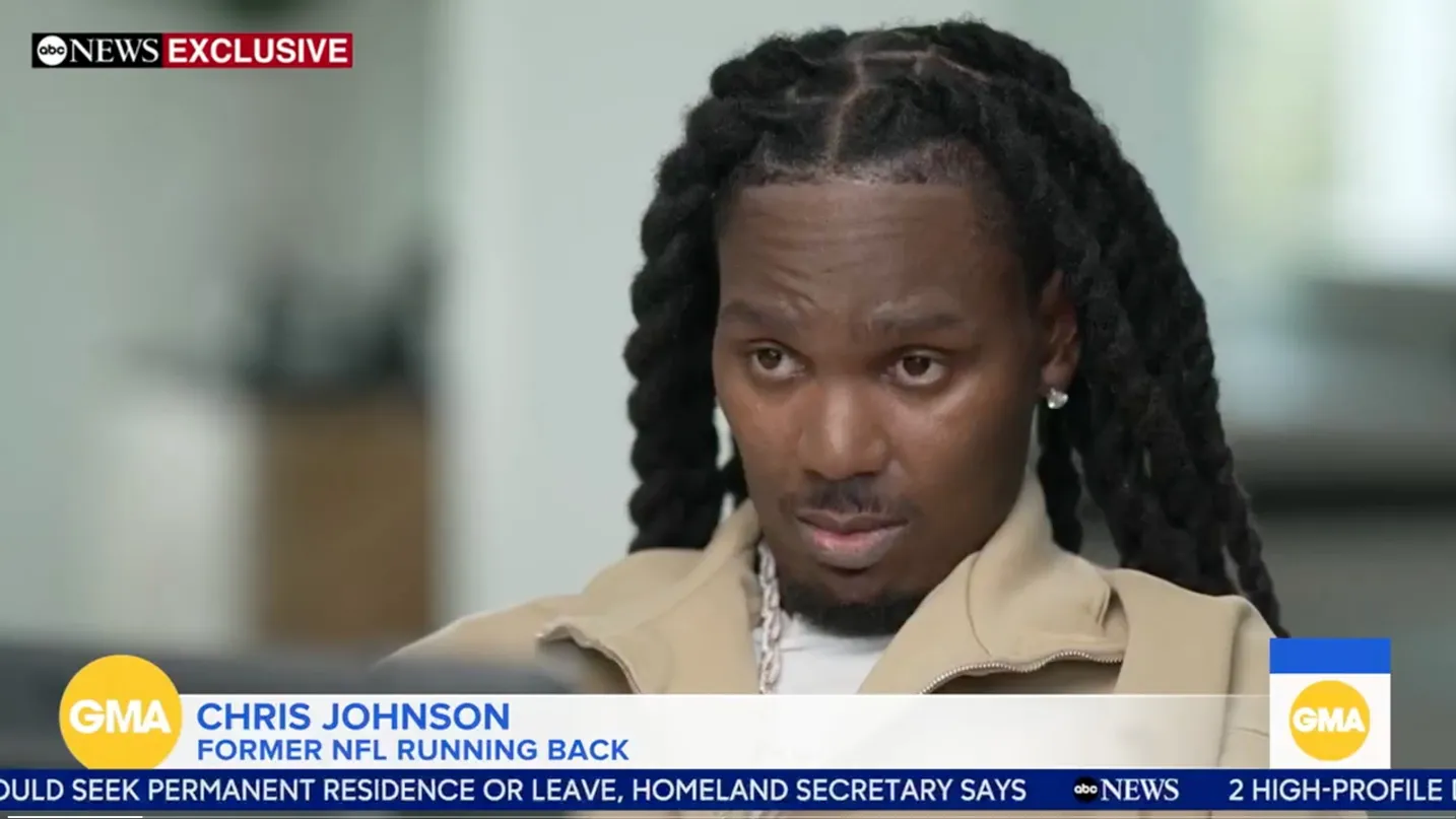 ABC News exclusive screenshot of Chris Johnson, former NFL running back, speaking during an interview, with GMA logo and lower third caption showing his name and title.