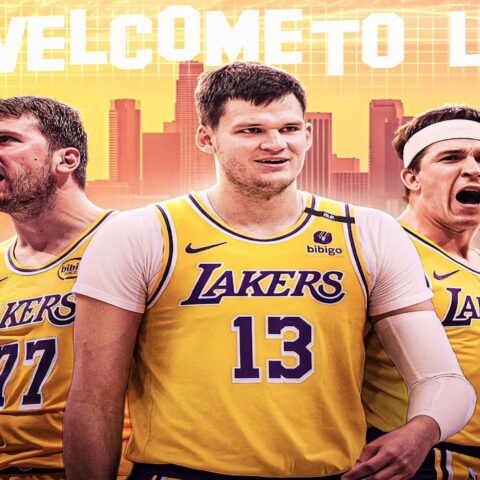 Three Los Angeles Lakers players in yellow jerseys (numbers 77, 13, and 15) stand in front of a city skyline with 'WELCOME TO LA' in bold white letters.