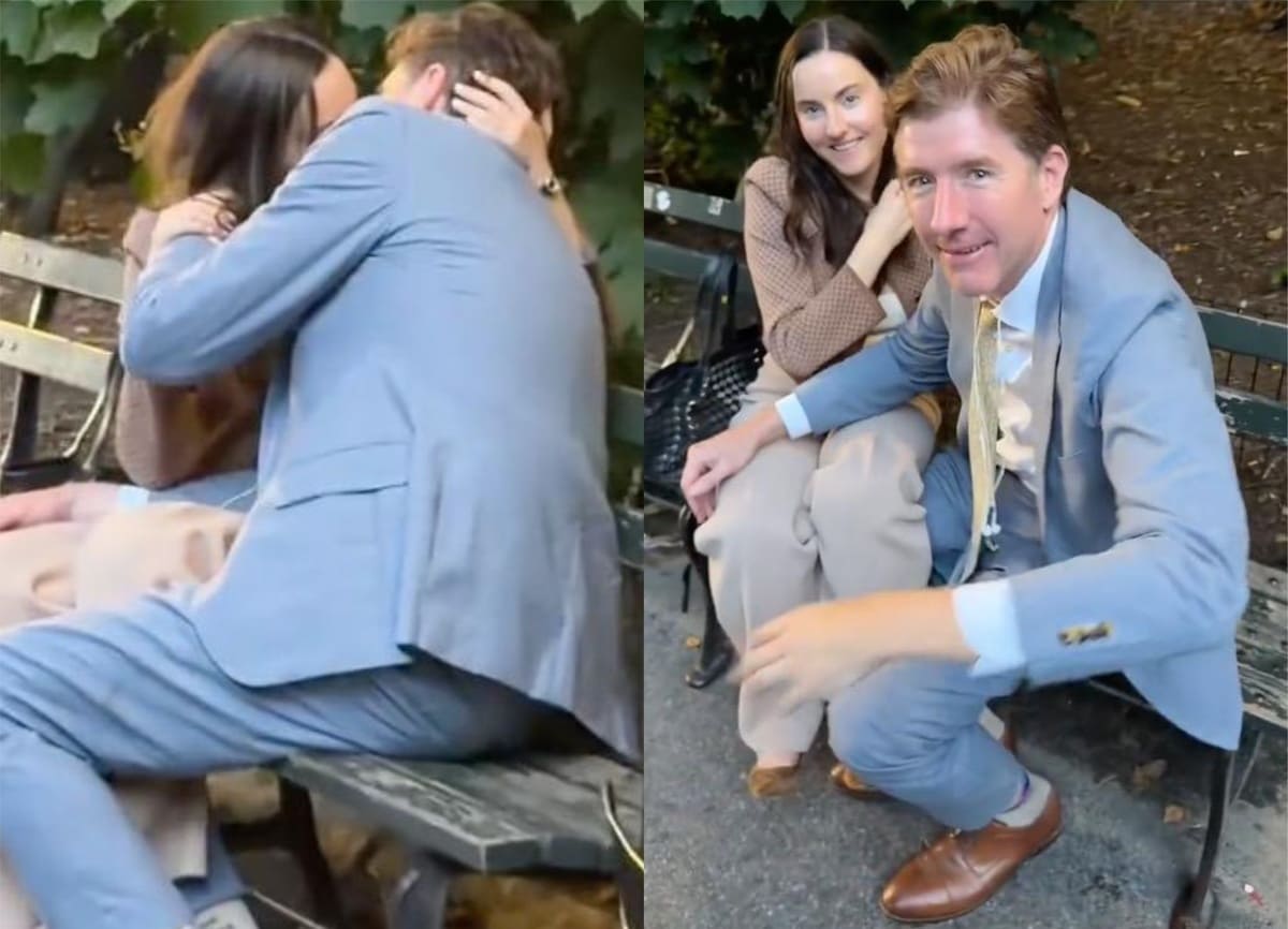 Couple kissing on a park bench; man in a light blue suit leans toward a woman in beige top.